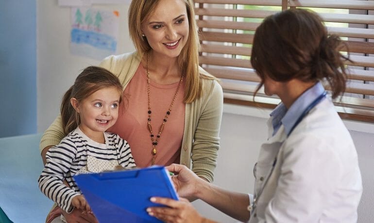 A woman is advising a young girl to choose a pediatrician.