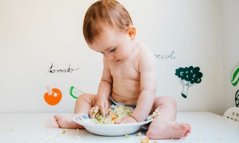 Introduce solid foods to baby.